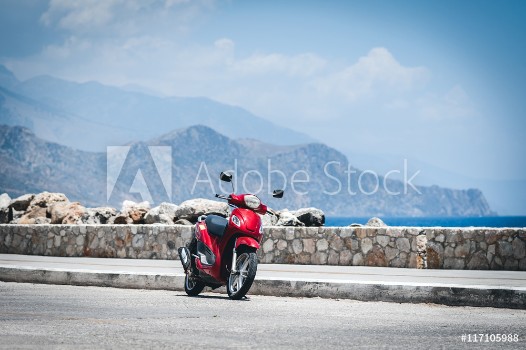 Picture of Red motorcycle near sea coastline at Paleochora town on Crete island